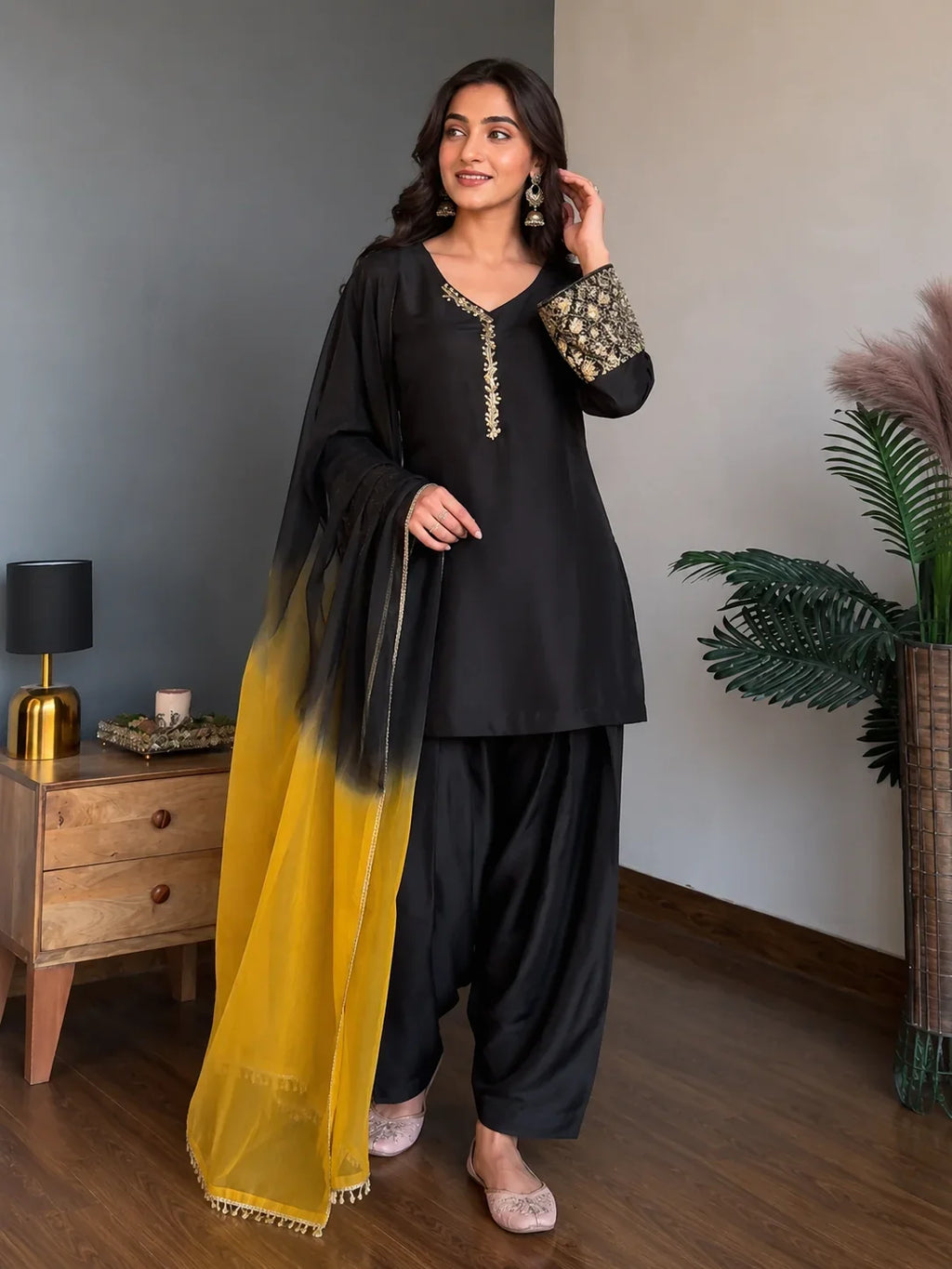 Graceful Black Embellished Farshi Kurta Ensemble